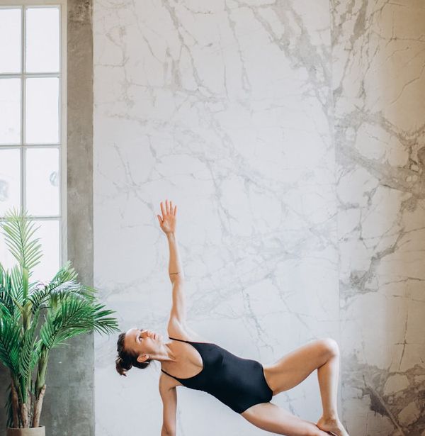 Main image of a person in a serene, balanced yoga pose.